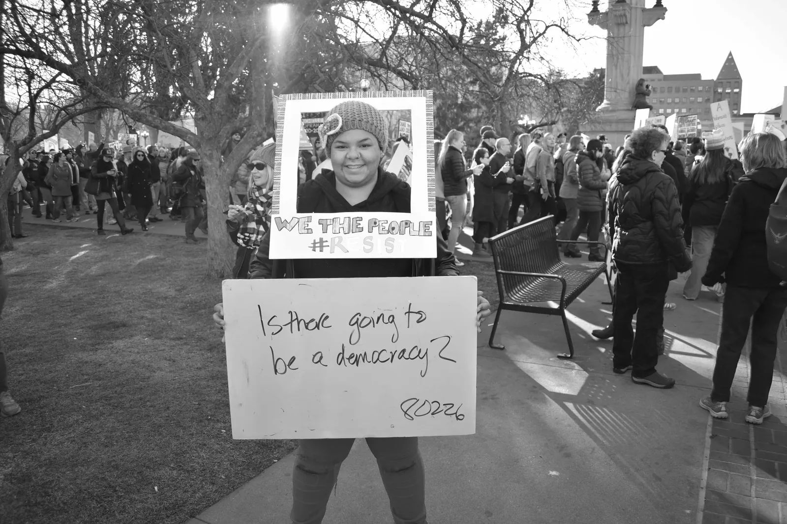 Protest sign: We the People